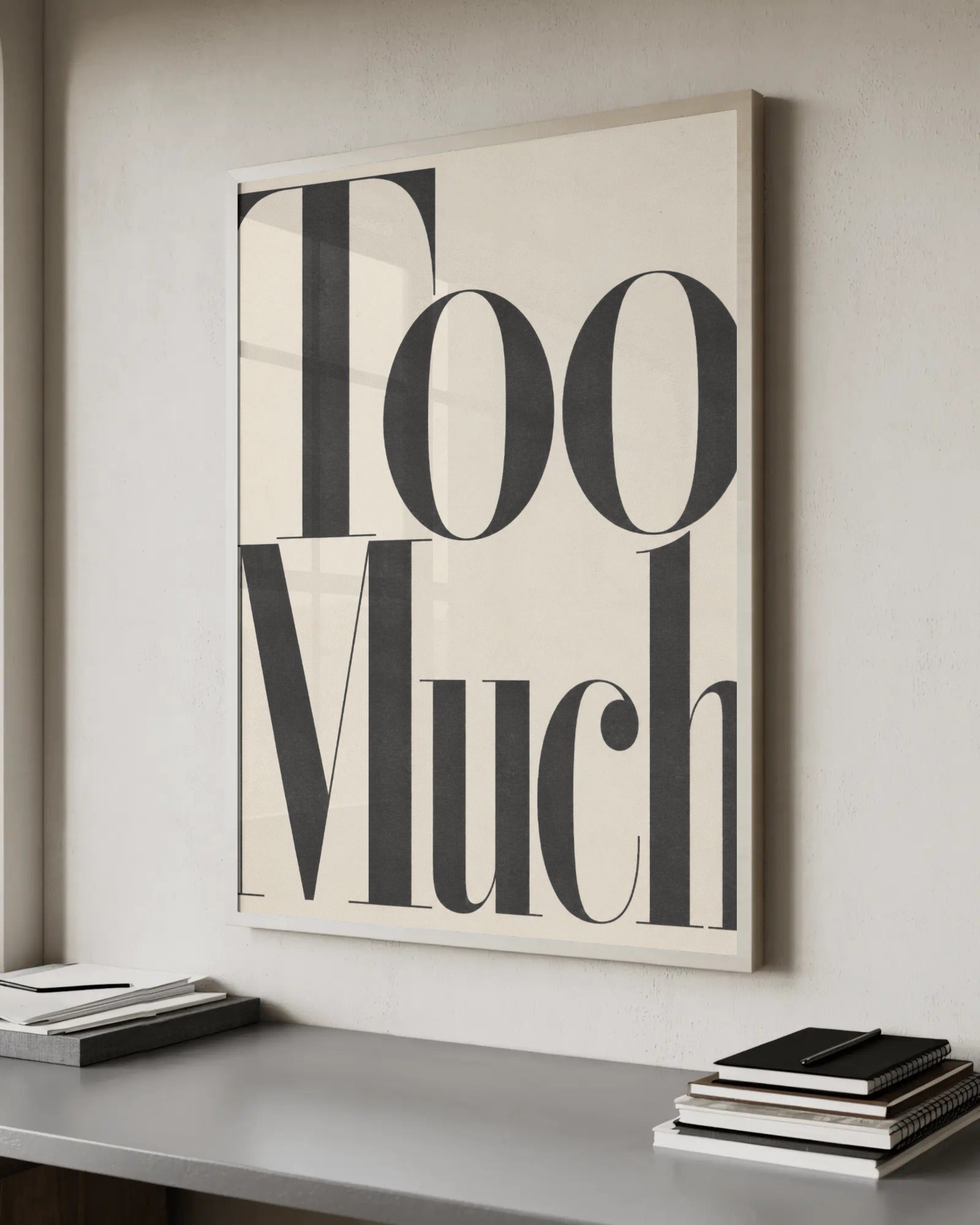 Editorial black serif lettering reading Too Much on a cream background, fashion-magazine style typography print